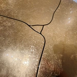 Gilded Crackle Dining Table with Fluid Black Pedestals